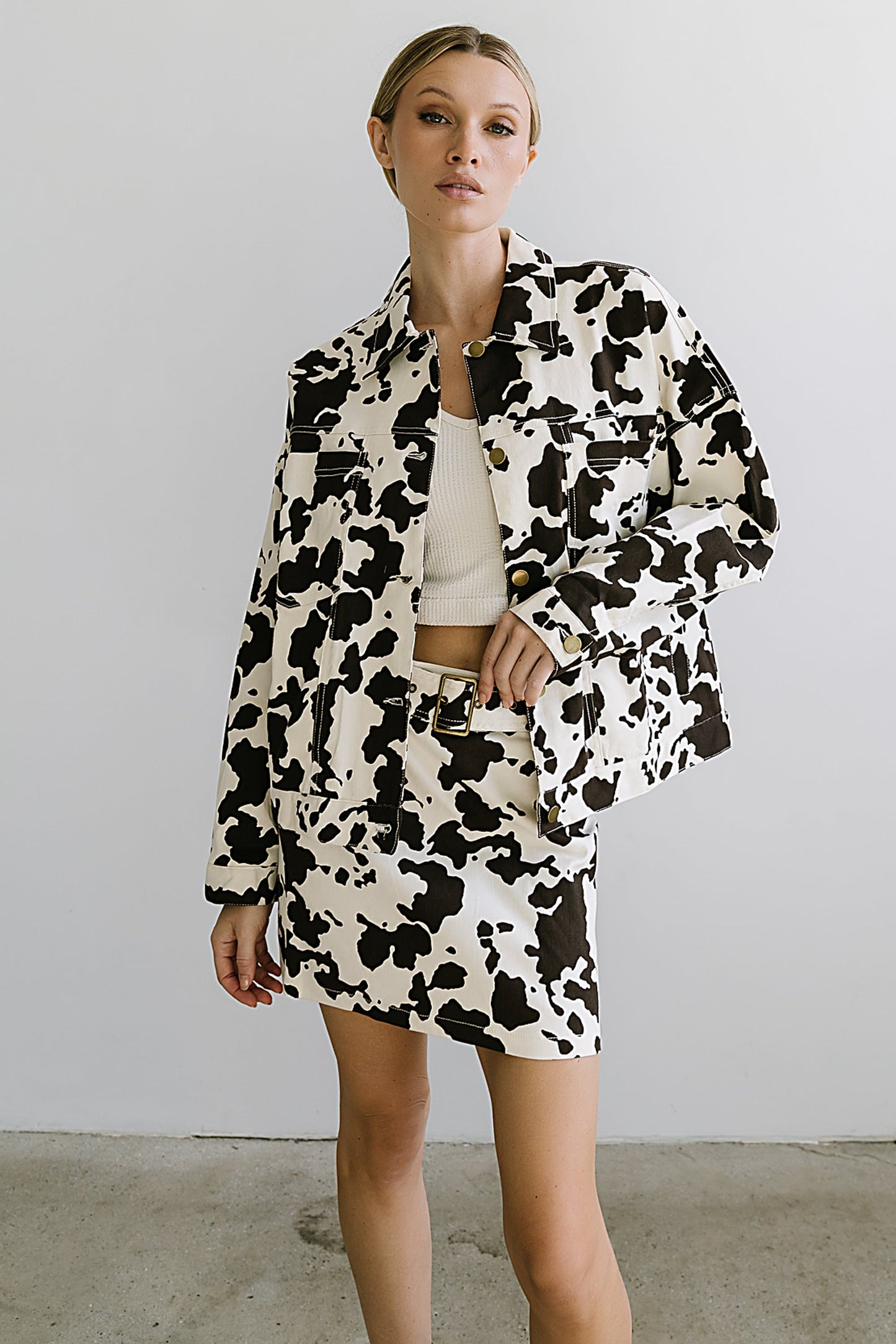 Tasha Cow Print Mini Skirt