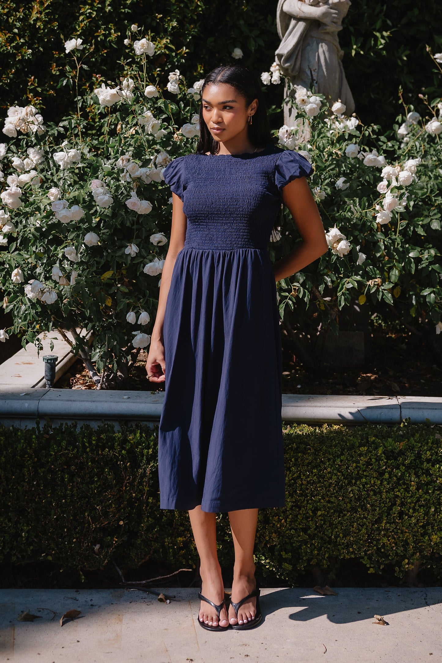 Harshell Smocked Midi Dress